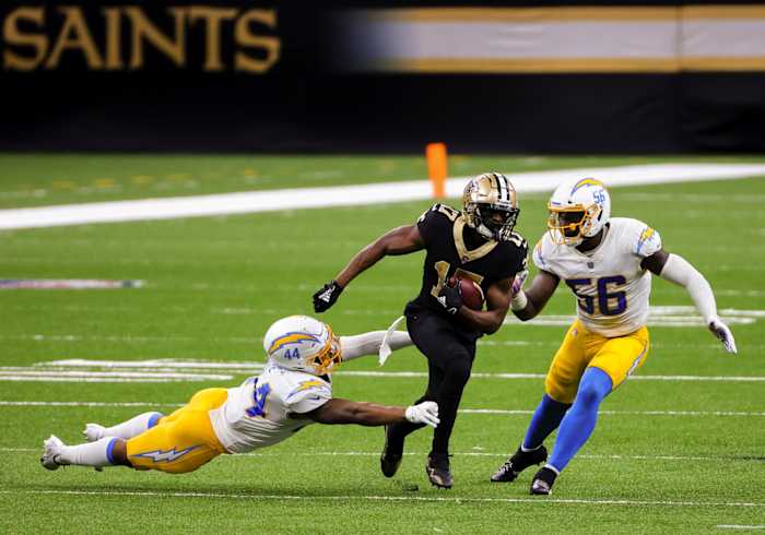 Oct 12, 2020; New Orleans, Louisiana, USA; Saints wide receiver Emmanuel Sanders (17) runs past Chargers linebackers Kyzir White (44) Kenneth Murray Jr. (56) at the Mercedes-Benz Superdome. Mandatory Credit: Derick E. Hingle-USA TODAY
